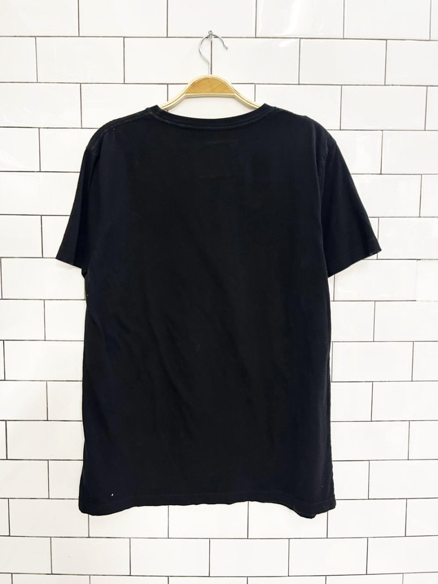 embrace leave nothing but footprints graphic tee - good market thrift store