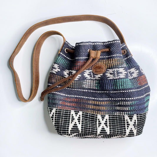 roots woven jute bucket bag with leather trim