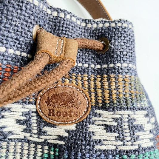roots woven jute bucket bag with leather trim