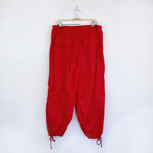 red nylon baggy parachute pants