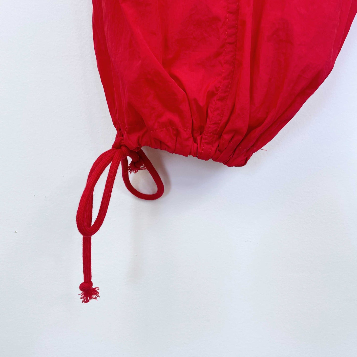 red nylon baggy parachute pants