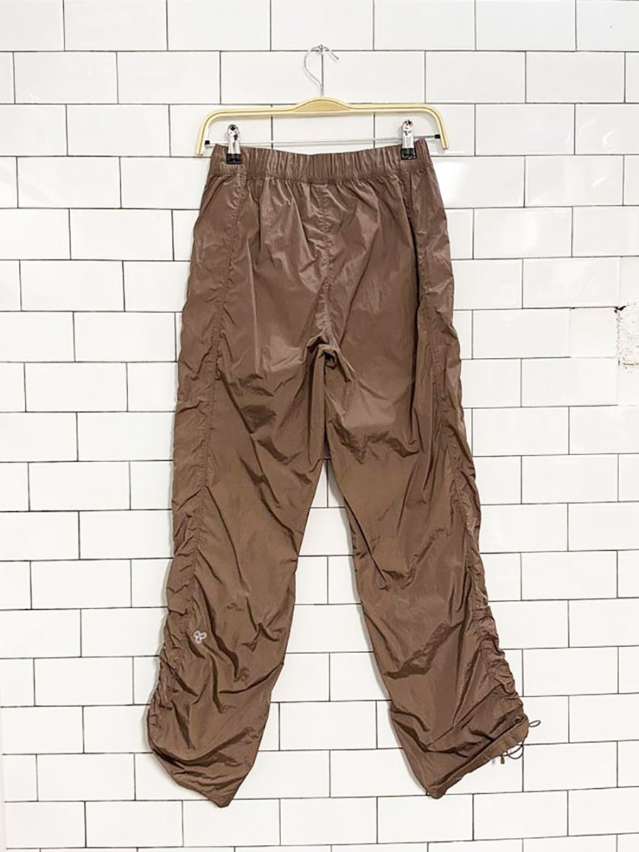 tnaAction nylon cinch ankle prima pant | aritzia - good market thrift store