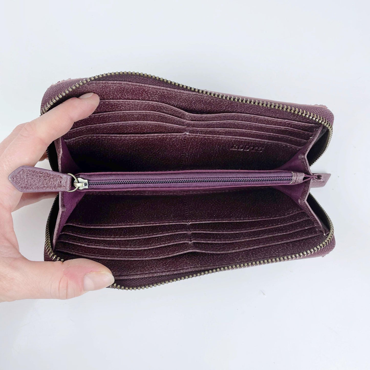 roots faux pebbled leather zip around wallet