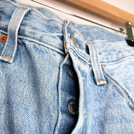 Levi's 501 high rise skinny jeans light wash raw hem - size 27