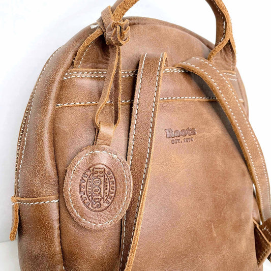 roots mini brown leather tribe backpack