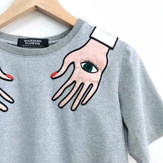 Standing Flower leather hands tee - size Medium