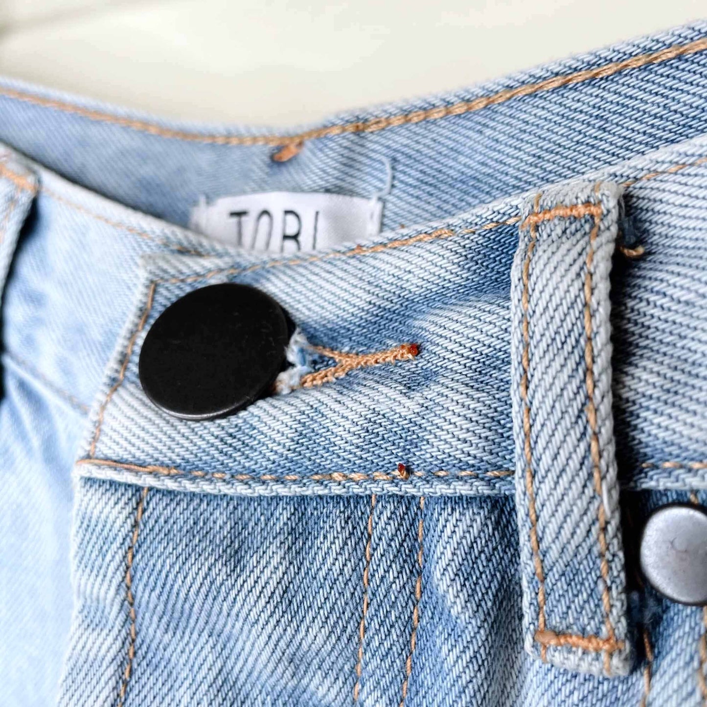 TOBI high rise button fly distressed jean shorts - size 27