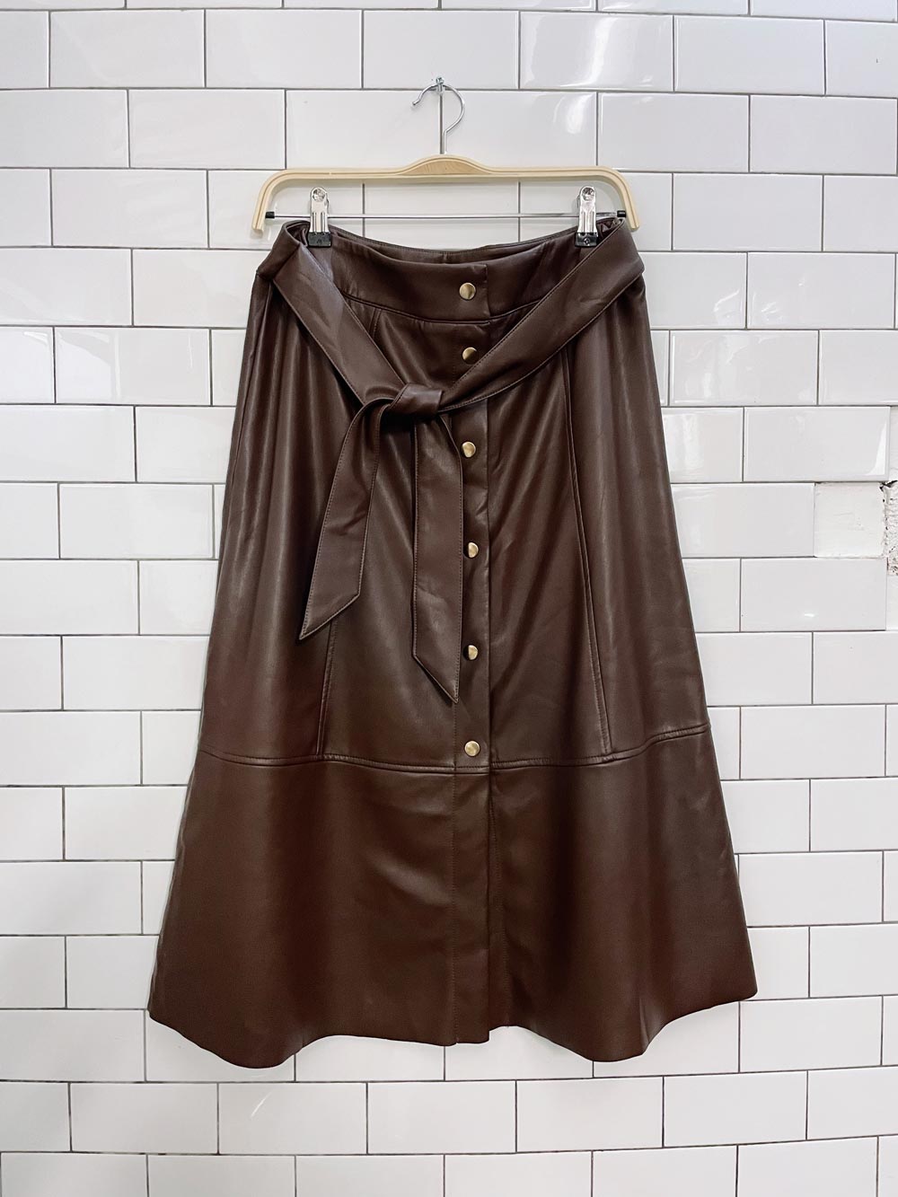 belle vere faux leather snap button midi skirt