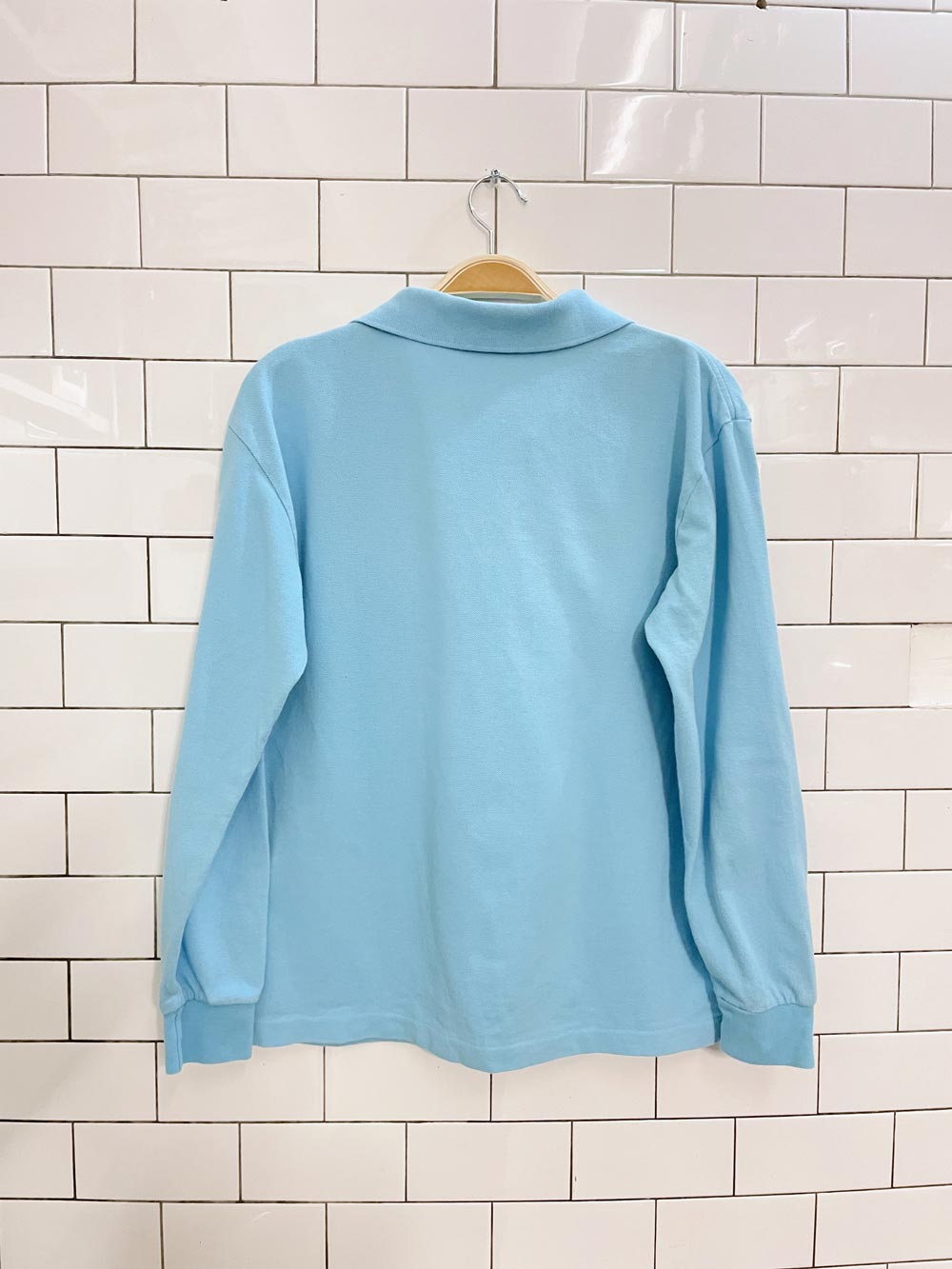 lacoste boxy fit waist length ls polo