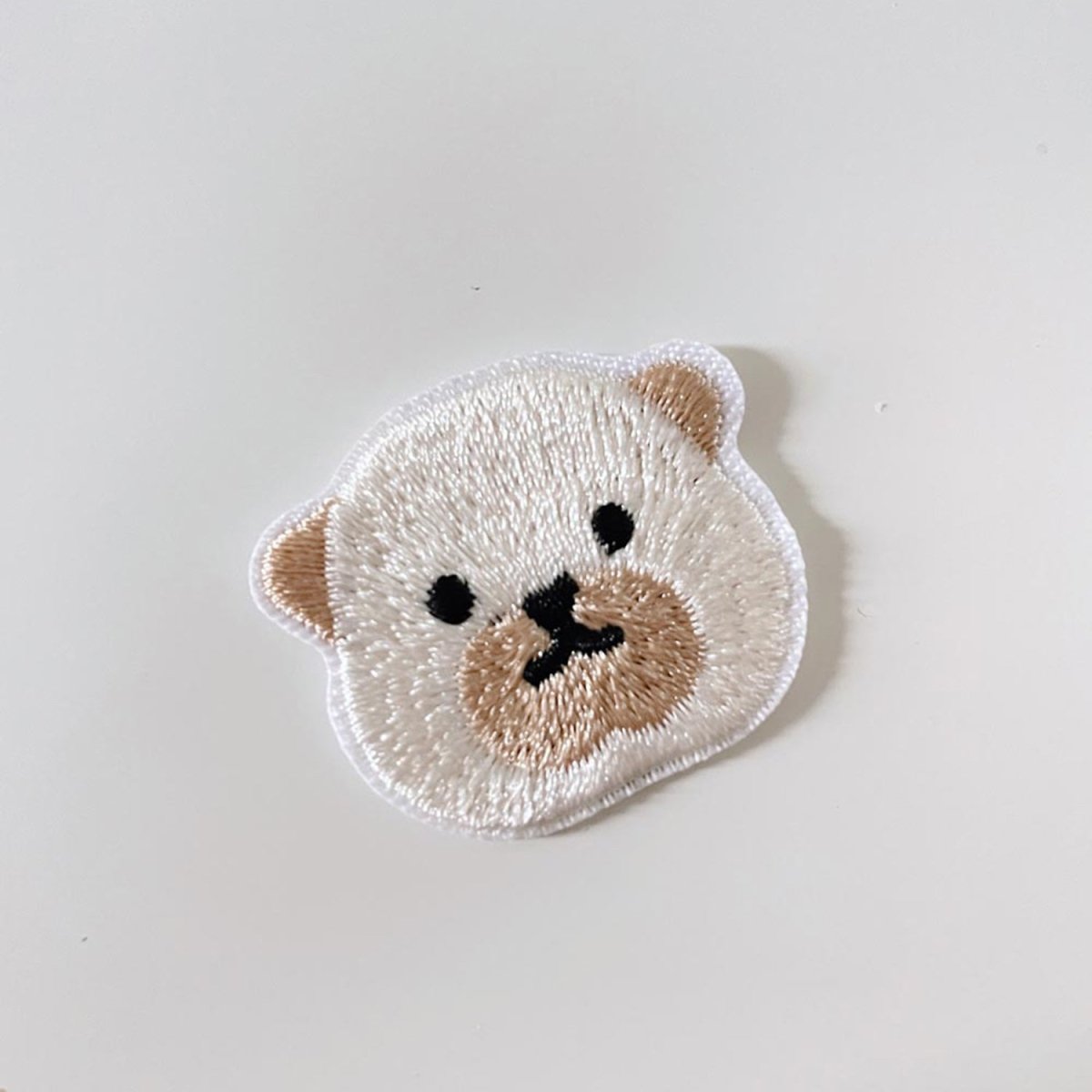 embroidered dog iron - on patch - good market thrift store