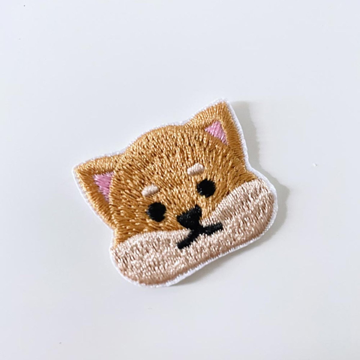 embroidered dog iron - on patch - good market thrift store