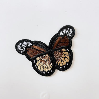 embroidered butterfly iron - on patch - good market thrift store