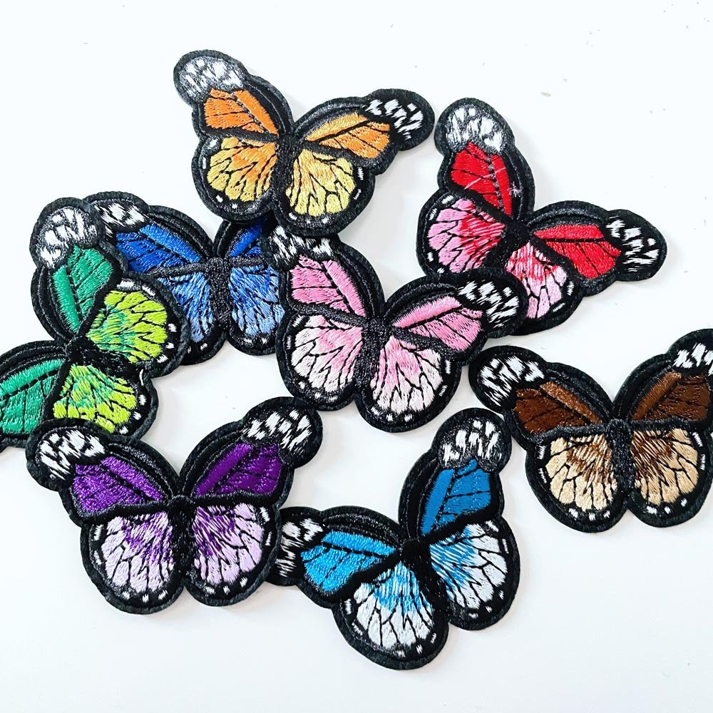 embroidered butterfly iron - on patch - good market thrift store