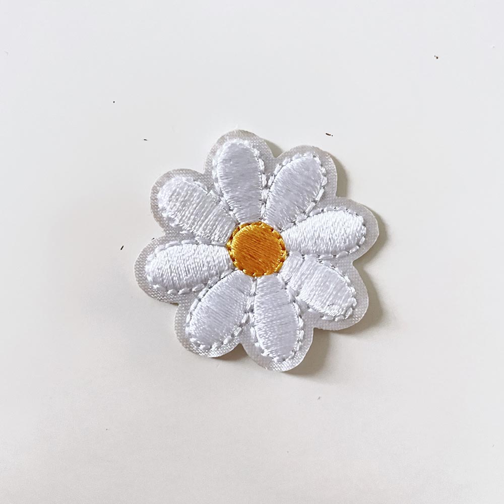 embroidered daisy iron - on patch - good market thrift store