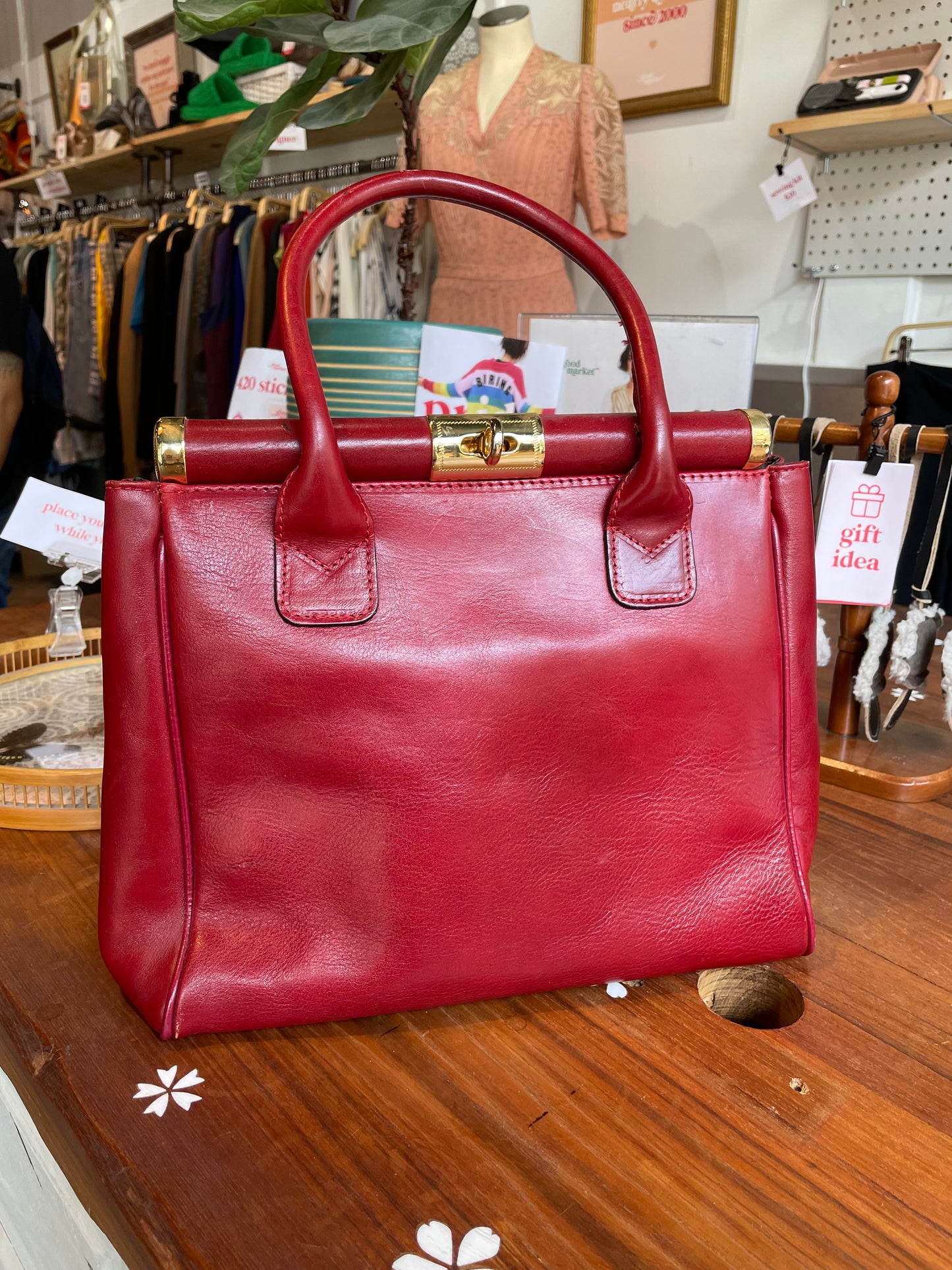 vintage red leather turn lock handbag
