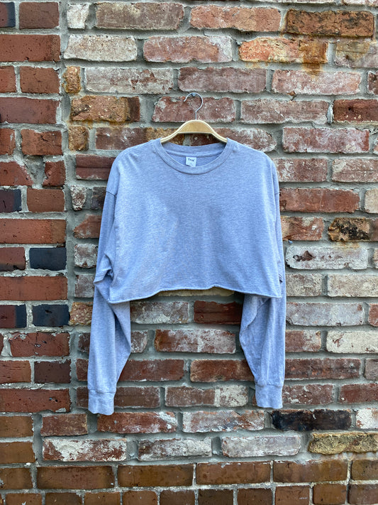 tna tour cropped long sleeve tee