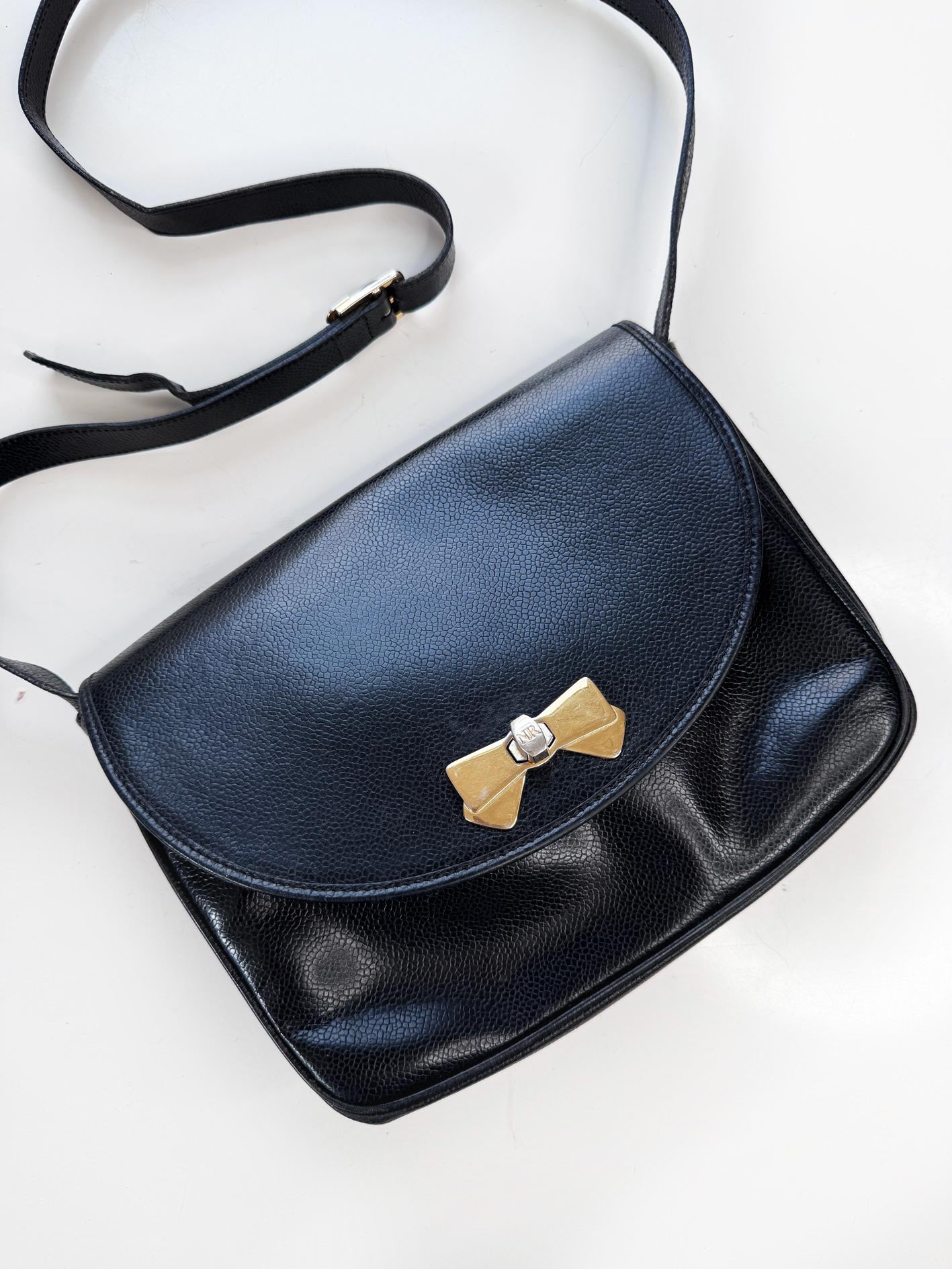 vintage nina ricci bow turn lock leather bag
