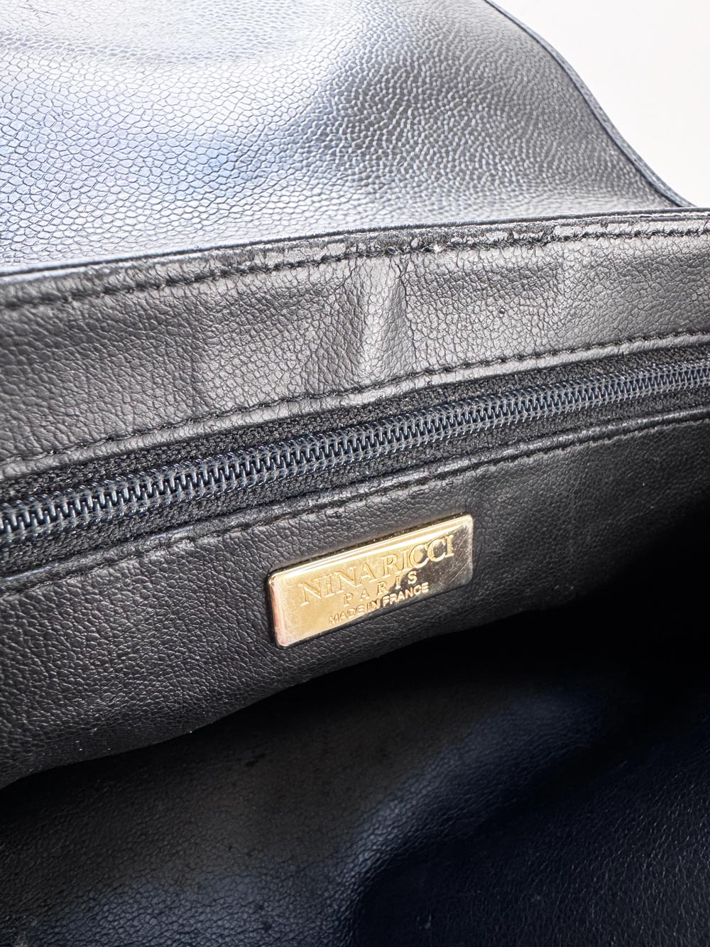 vintage nina ricci bow turn lock leather bag
