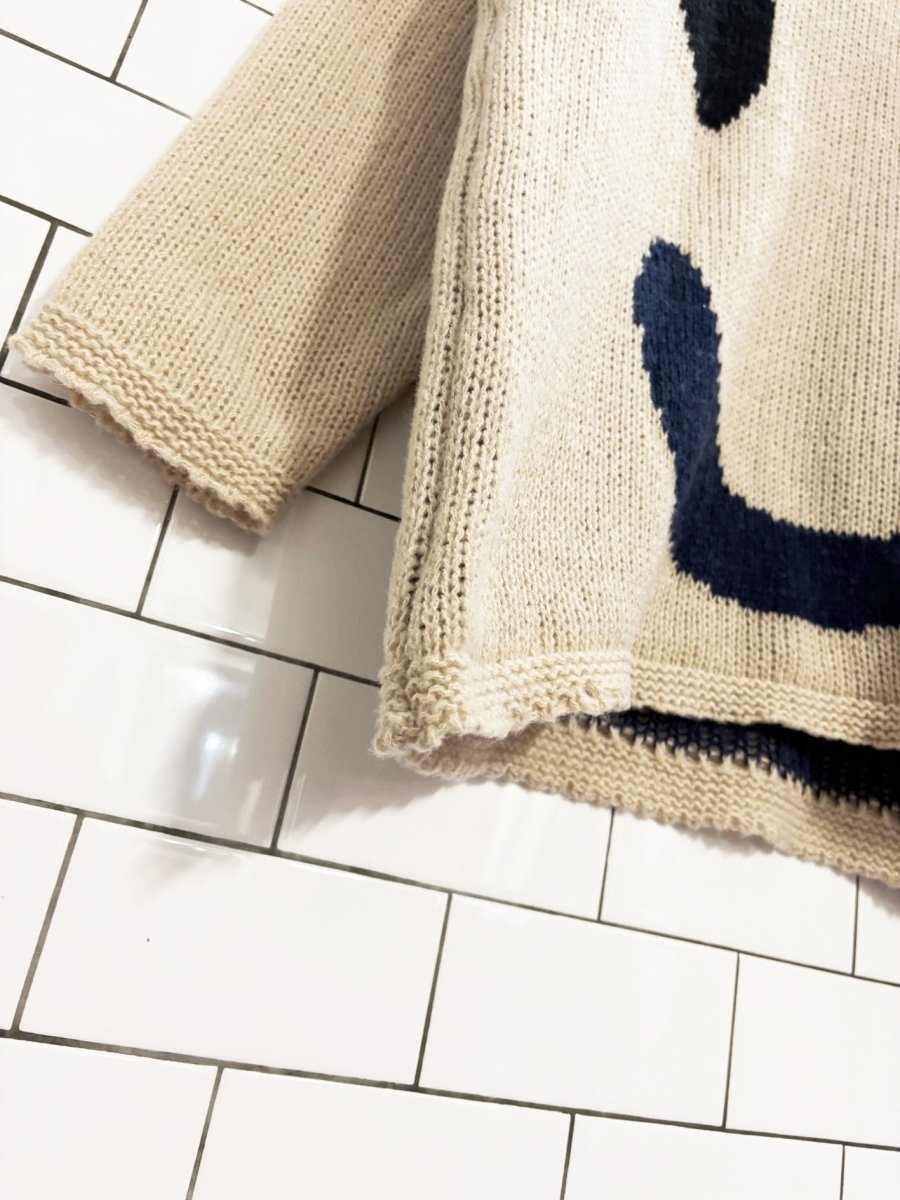 wink face loose knit oversized sweater - good market thrift store