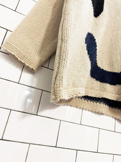 wink face loose knit oversized sweater - good market thrift store