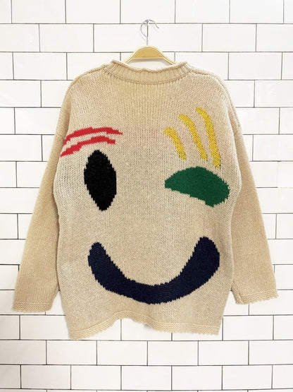wink face loose knit oversized sweater - good market thrift store