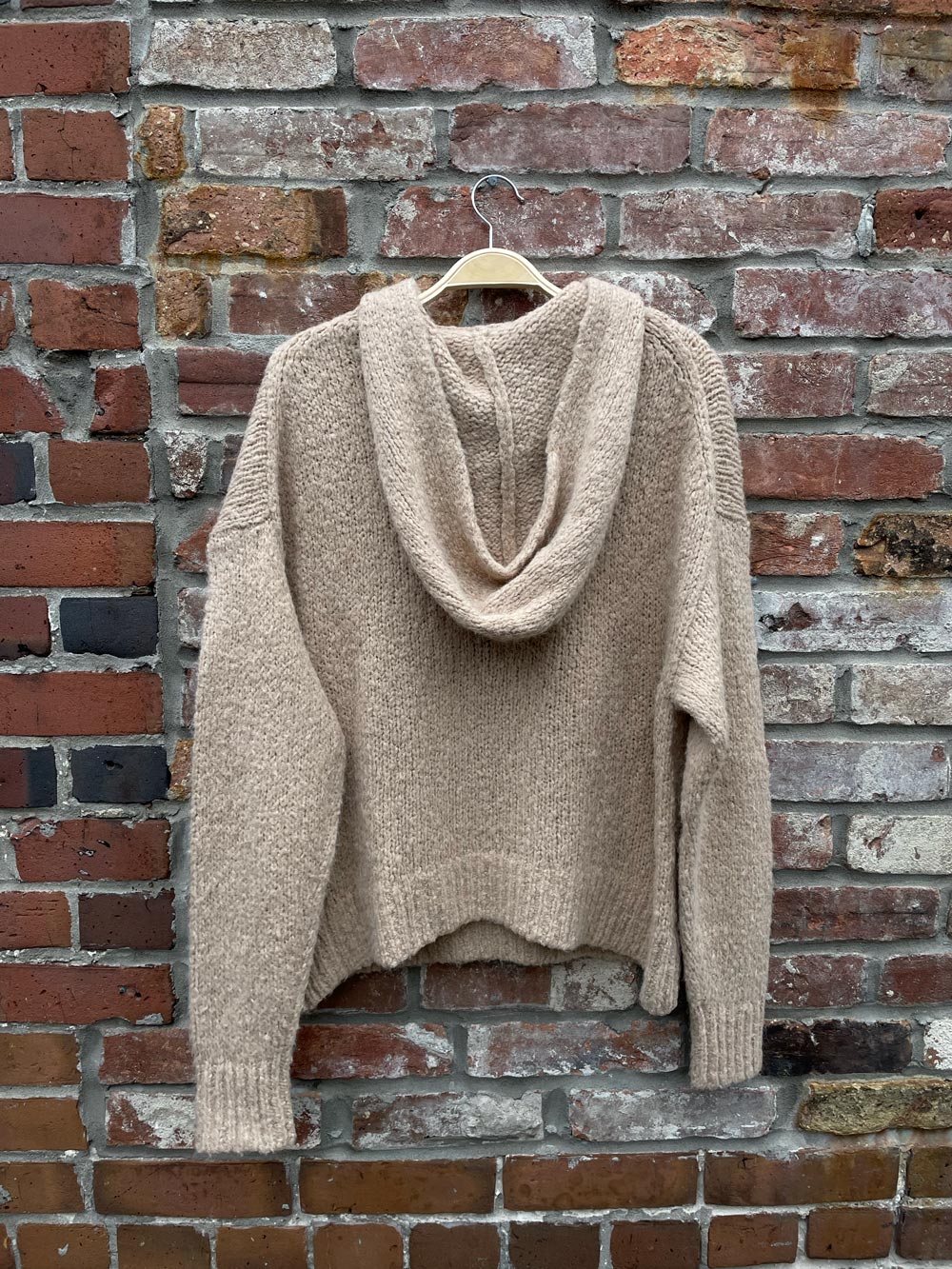 the group babaton alpaca wool hooded sweater
