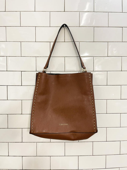 calvin klein faux leather shoulder tote w pouch - good market thrift store