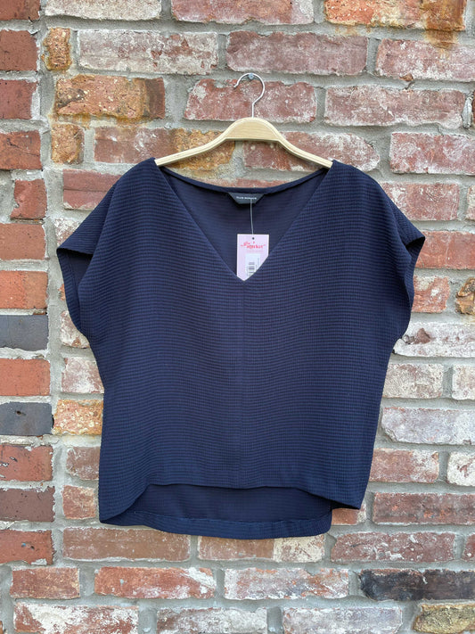 club monaco oversized textured v-neck blouse