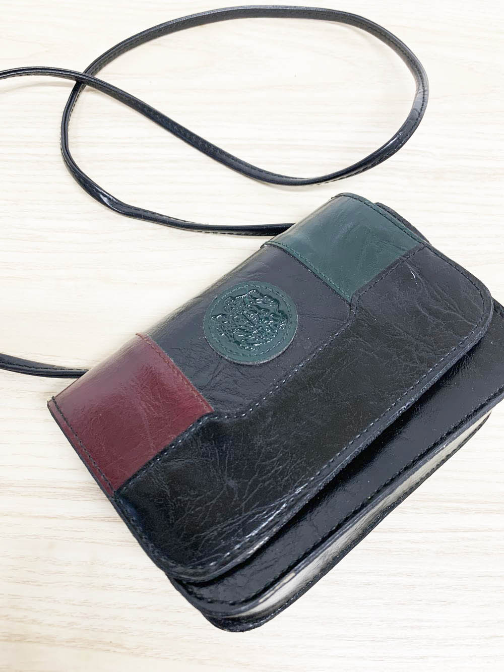 vintage vegan leather crest color block structured crossbody bag