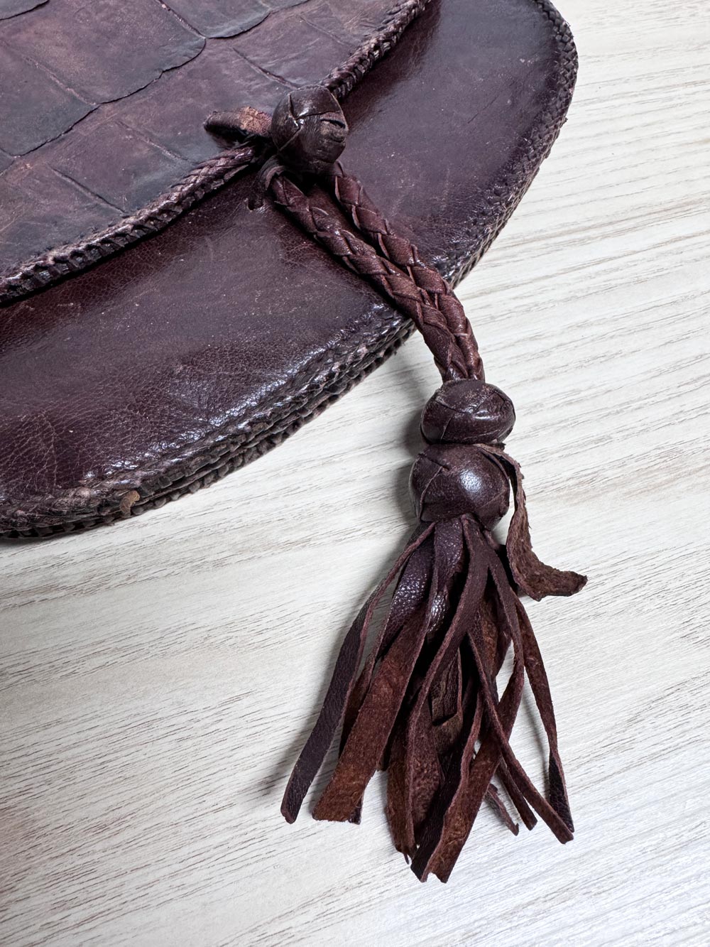 vintage leather croc print saddle bag w tassel