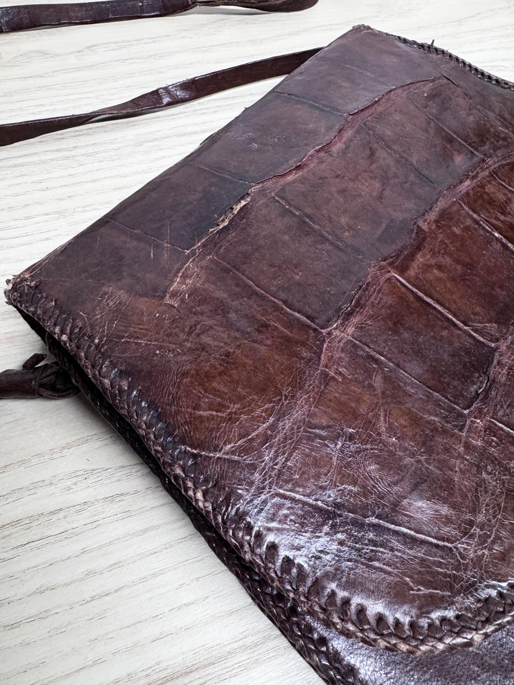 vintage leather croc print saddle bag w tassel