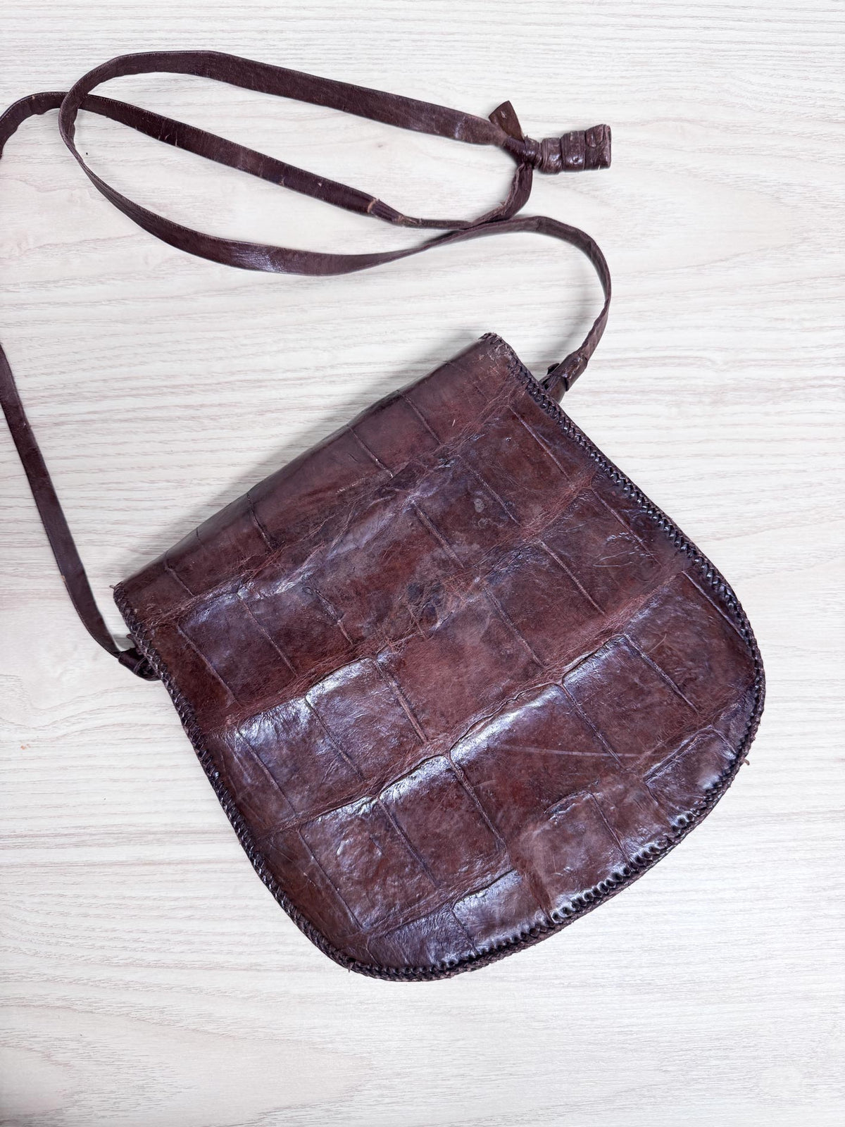 vintage leather croc print saddle bag w tassel