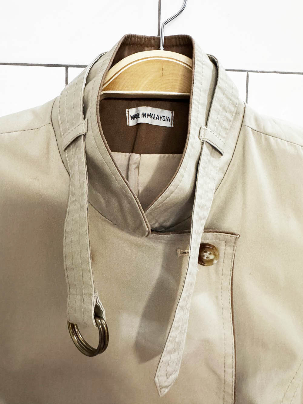 vintage 80s rain shedder puff shoulder cinch waist double breasted a-line trench coat | ken meritt
