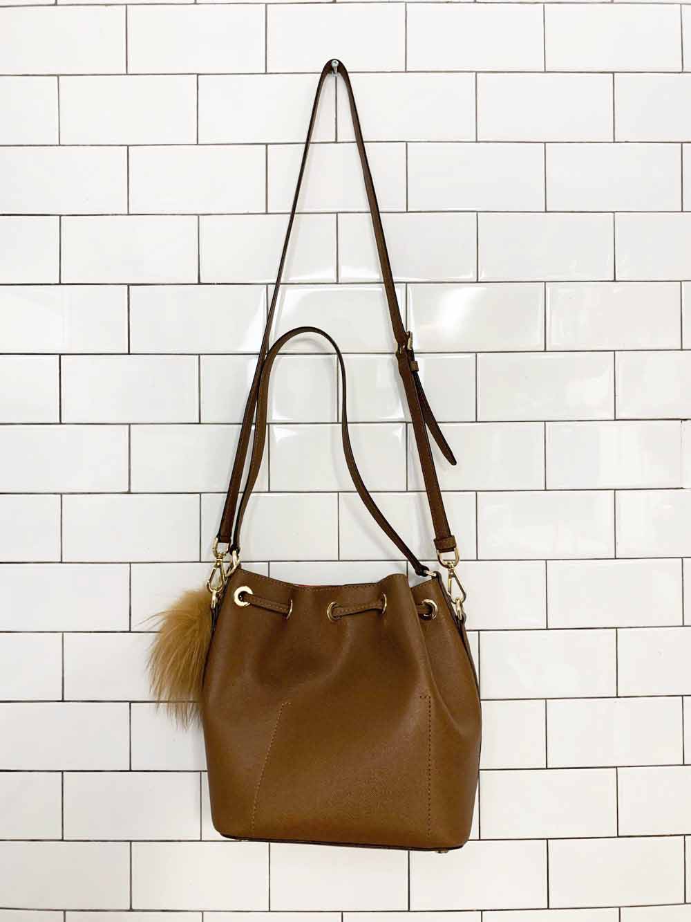 michael kors faux leather pom charm bucket bag