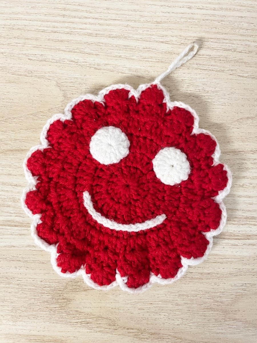 vintage handmade knit smiley face trivet - good market thrift store