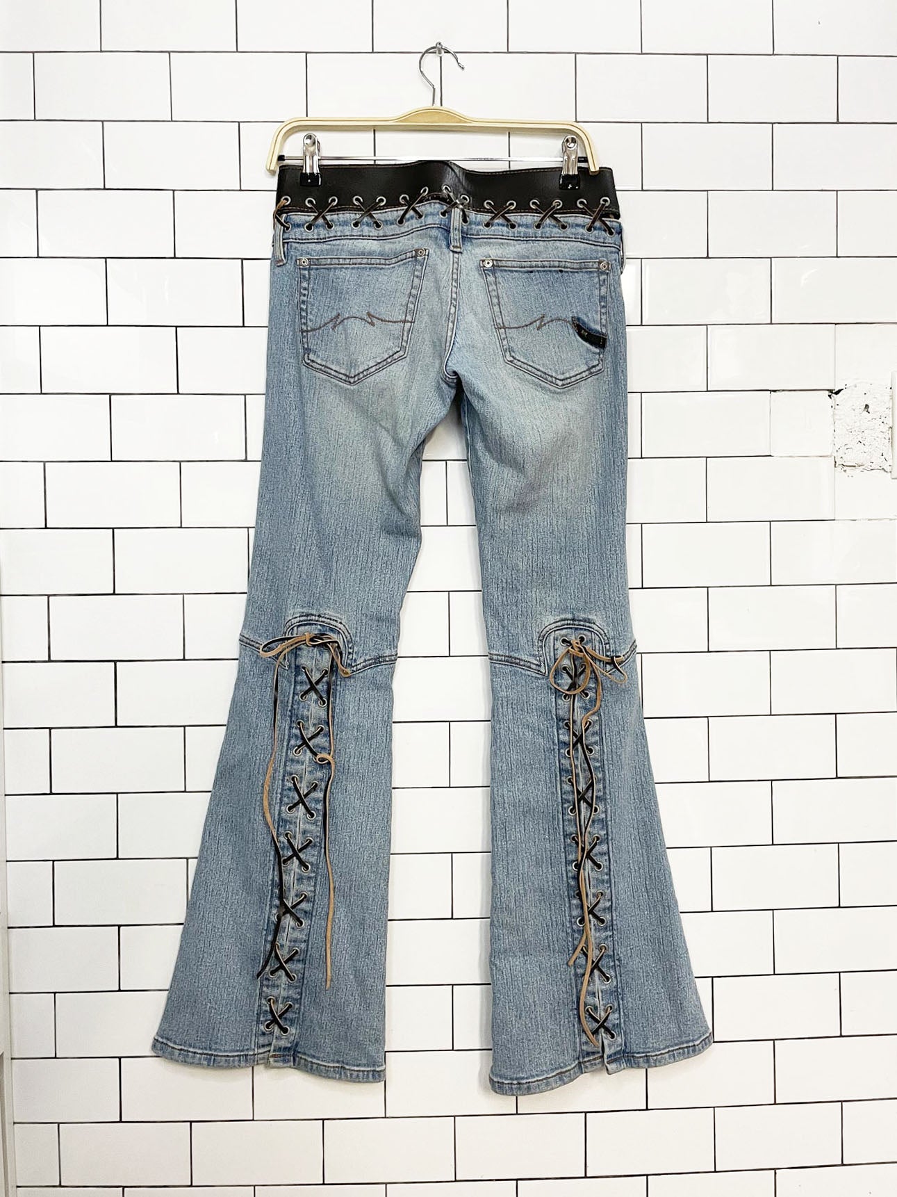 y2k parasuco low rise belted leather lace up flare leg jeans