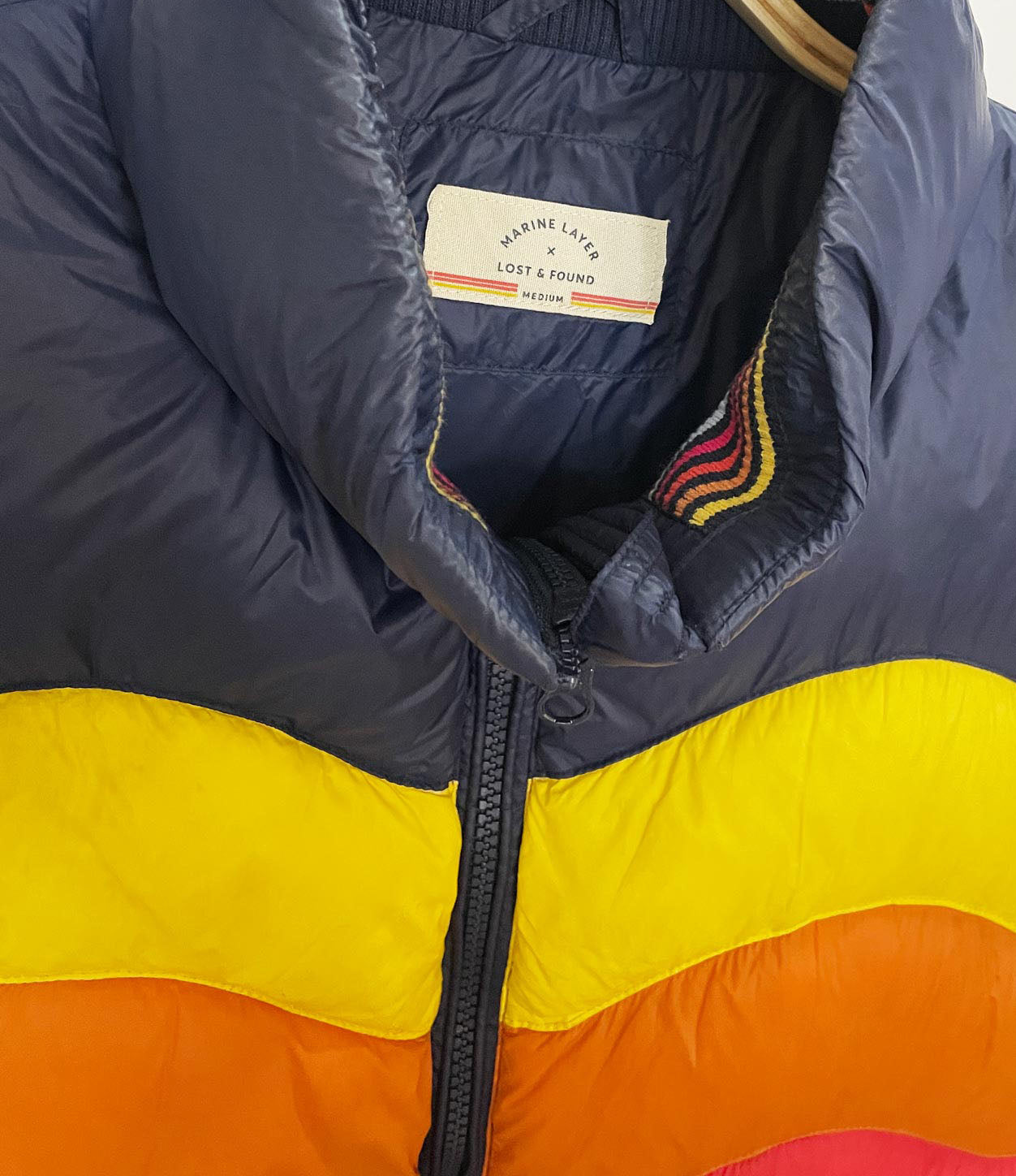 marine layer x lost & found aprés rainbow wave down feather puffer vest
