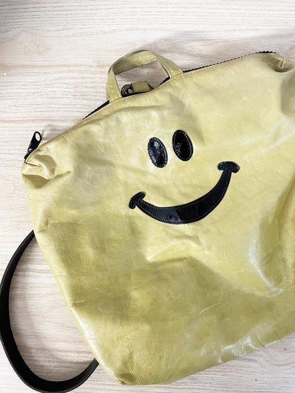 it's not me it's you london leather smiley backpack - good market thrift store
