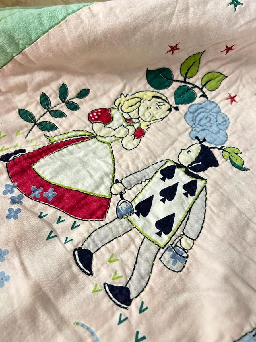 vintage handmade alice in wonderland quilted blanket - good market thrift store