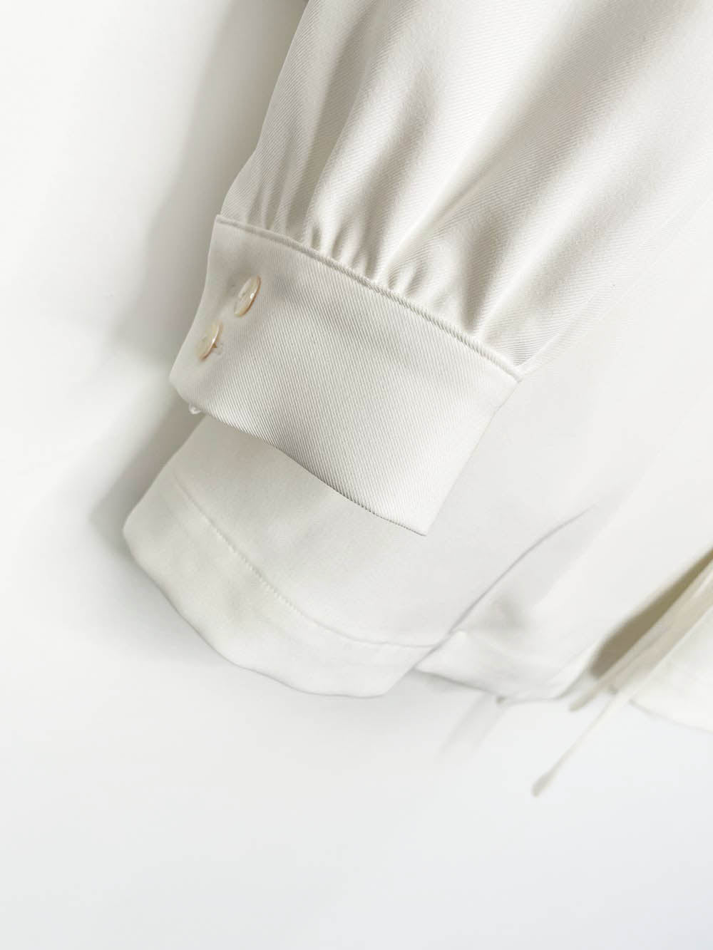 etik nor puff shoulder structured wrap mini dress | made in Sweden