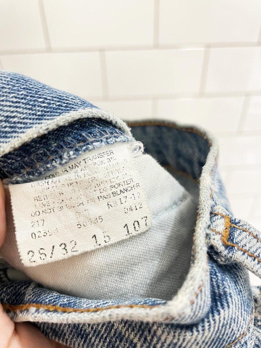 vintage 90s levis 585 baggy leg raw hem jeans - good market thrift store