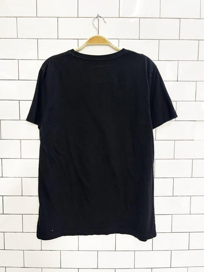 embrace leave nothing but footprints graphic tee - good market thrift store