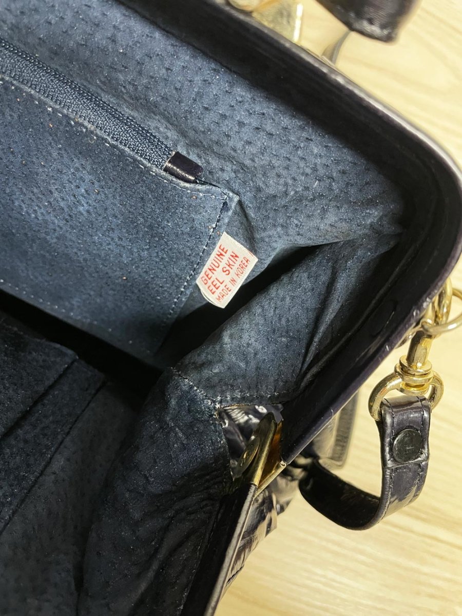 vintage 80s eelskin leather satchel | suede lining | made in korea - good market thrift store