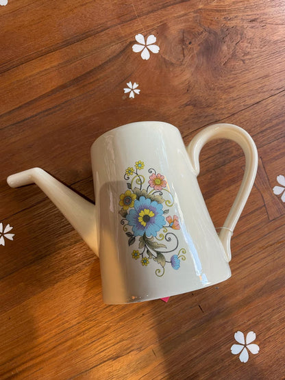 handmade floral pottery watering can