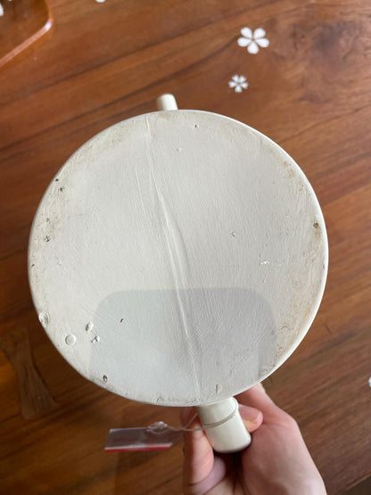 handmade floral pottery watering can