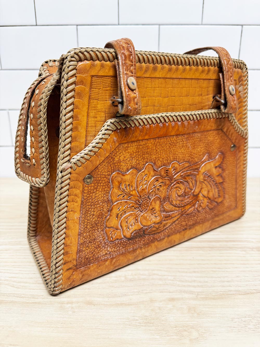 vintage 70s tooled leather braided edge structured handbag | lightning zipper