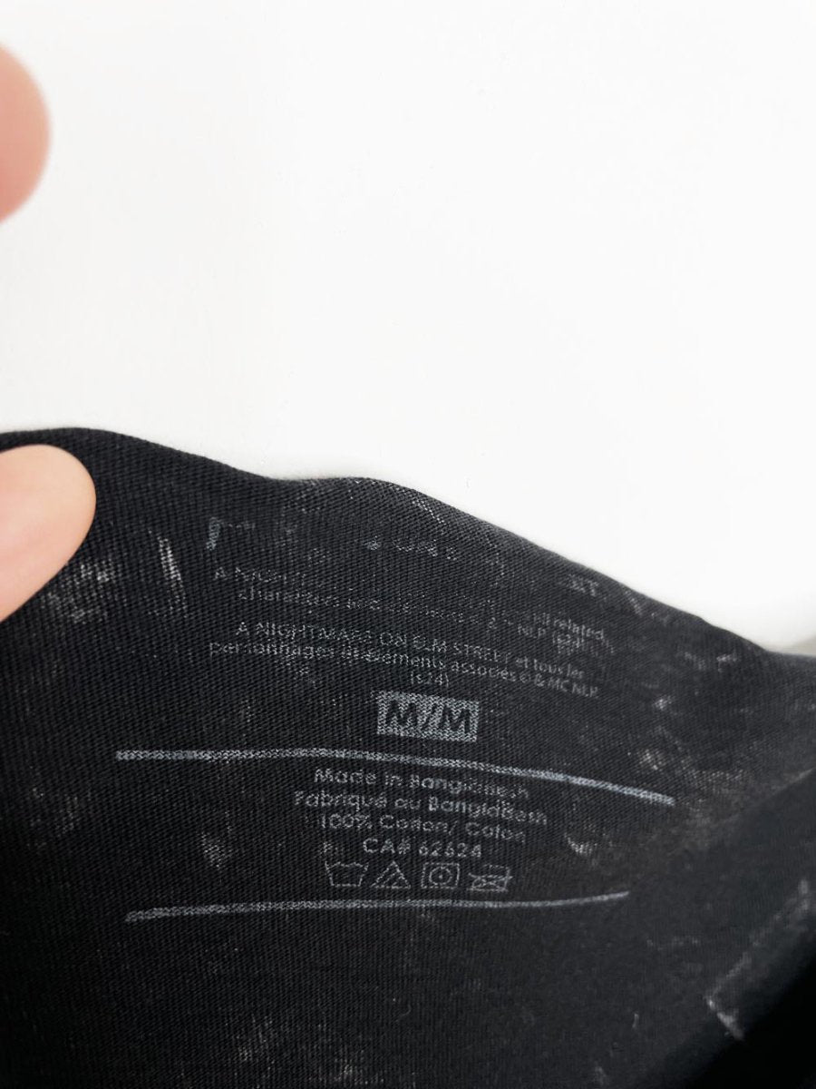 a nightmare on elm street off shoulder acid wash graphic tee | halloween - good market thrift store