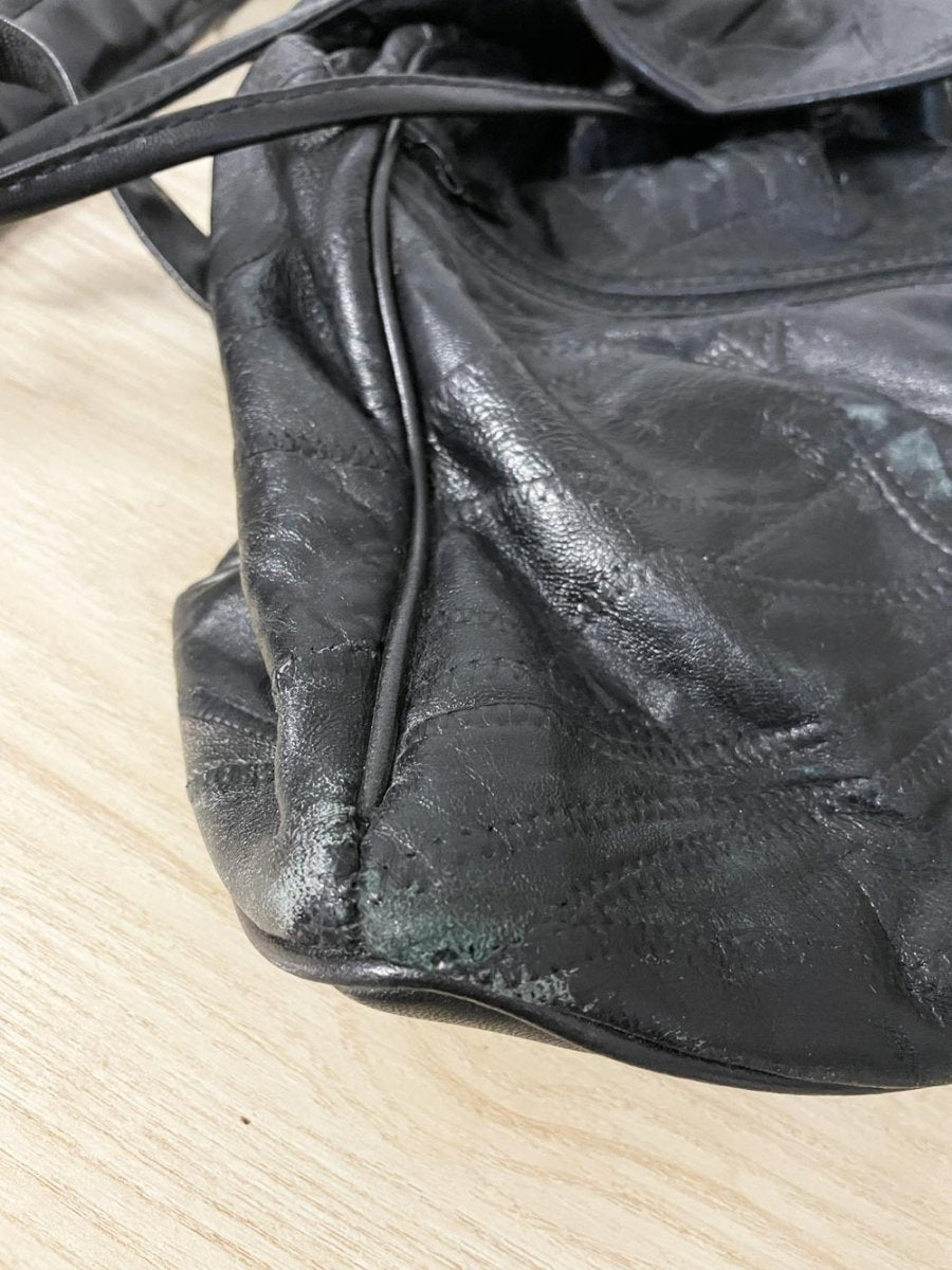 vintage 90s grunge leather patchwork backpack - good market thrift store