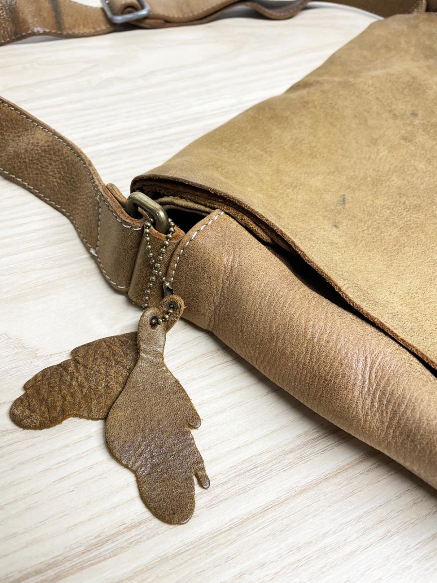 vintage roots tribe raiders leather messenger bag - good market thrift store