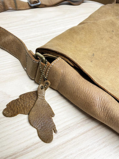 vintage roots tribe raiders leather messenger bag - good market thrift store